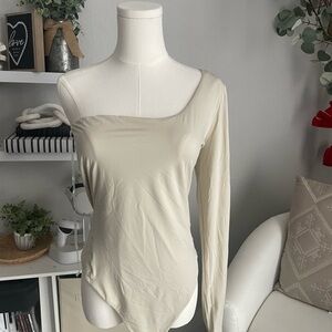 Lululemon NULU  One-Shoulder long sleeve Bodysuit in color Mojave tan